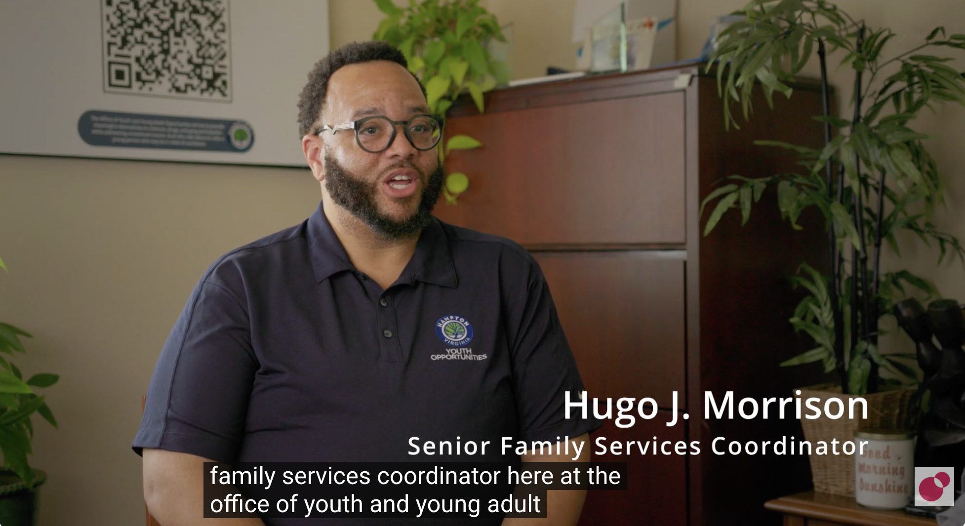 Hugo J. Morrison, Senior Family Services Coordinator, speaking in his office