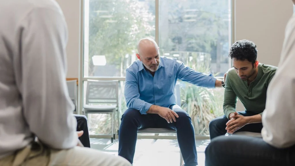 Case manager meeting one-on-one with a client